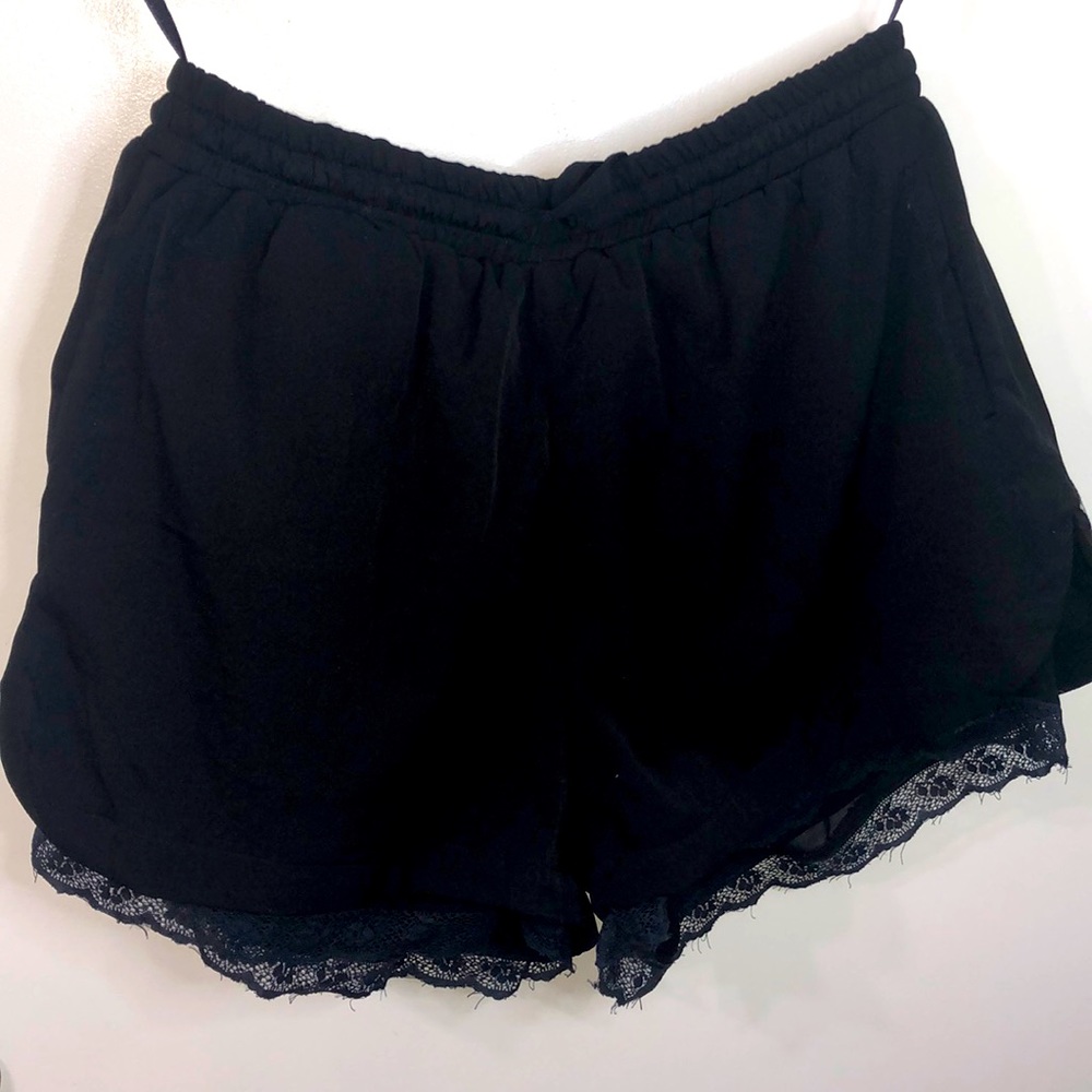 Black shorts with lace hem